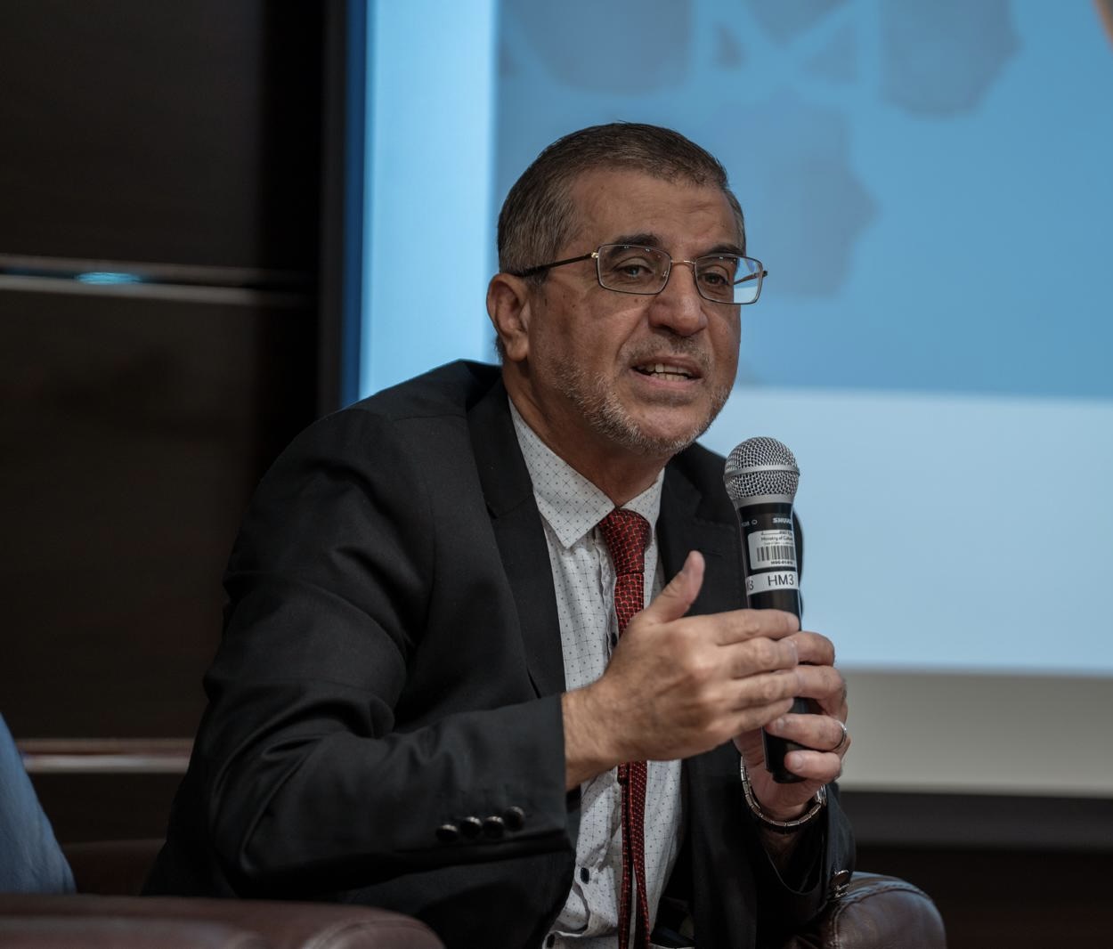 Dr. Mohsen Alafranji speaking at a conference
